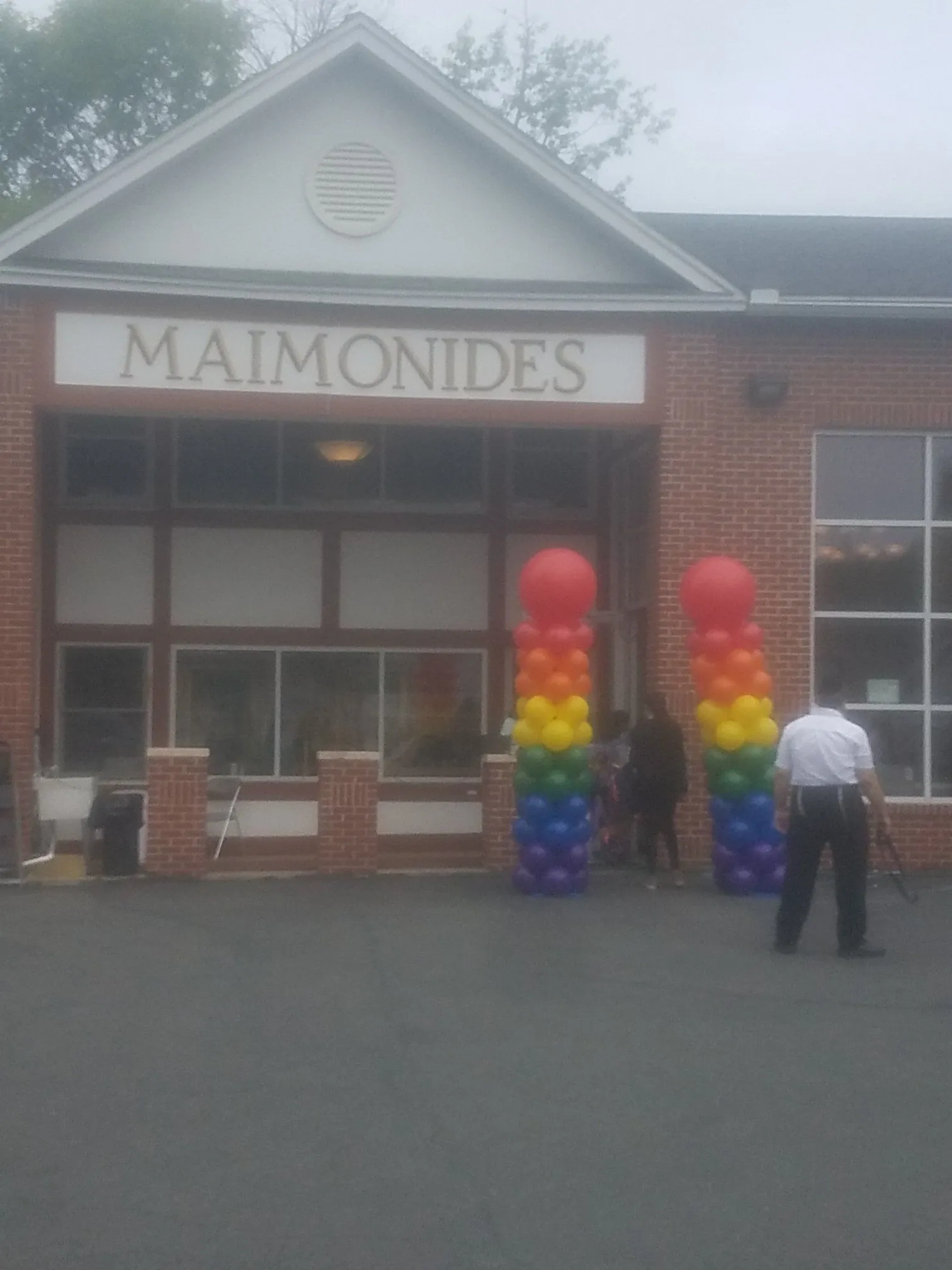 Rainbow Balloon Columns at School Entrance